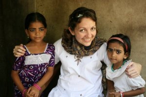 Amber, in one of her trips, sharing with two little Indian girls