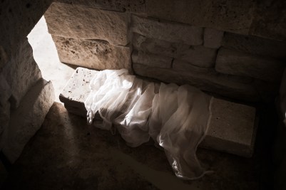 Empty tomb while light shines from the outside. Jesus Christ Resurrection. Christian Easter concept.